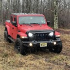Playing in the woods with new ride.