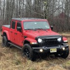 Playing in the woods with new ride.